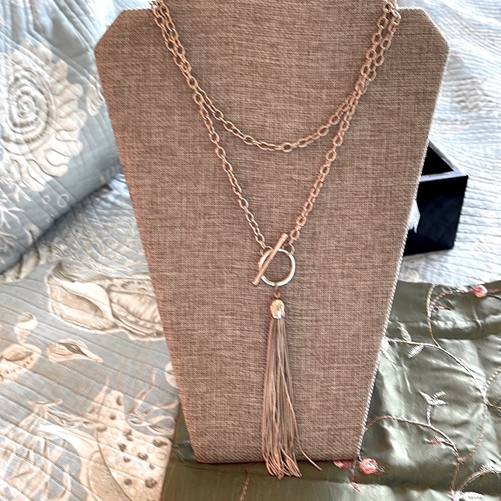 Long 22” gold tone chain with toggle clasp scan be double or left long